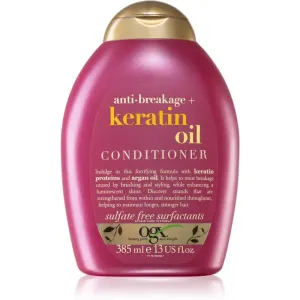 OGX Keratin Oil après-shampoing fortifiant à la kératine et huile d'argan 385 ml